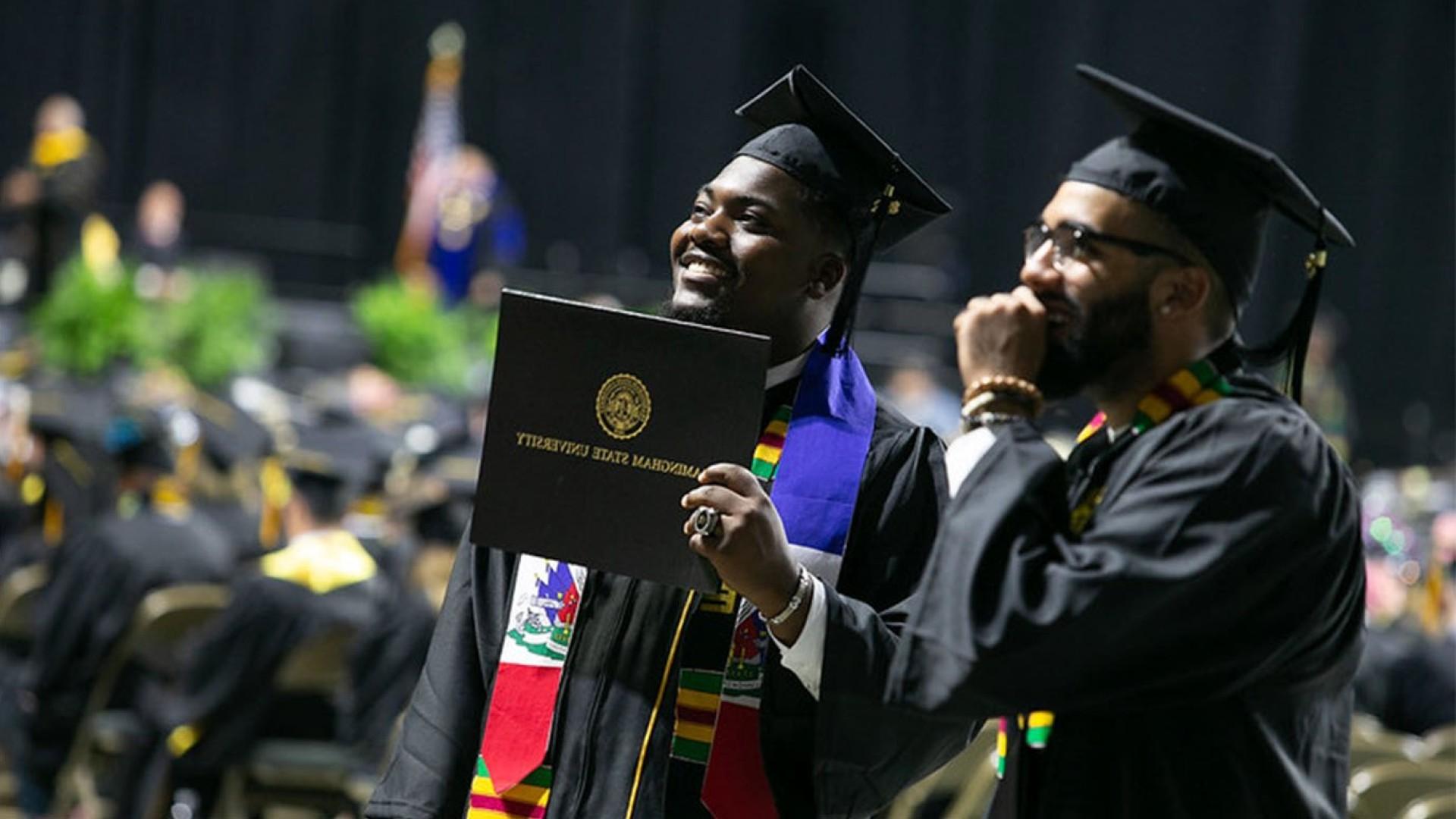 students celebrating at graduation